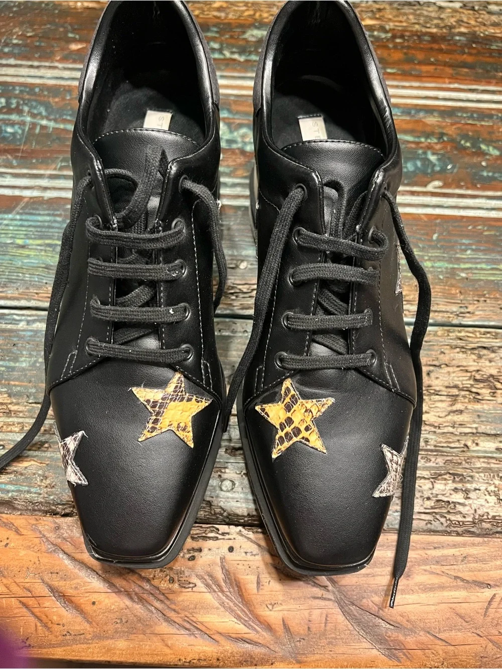 Stella McCartney Black Platform Lace-Up Sneakers with Multicolor Star Accents